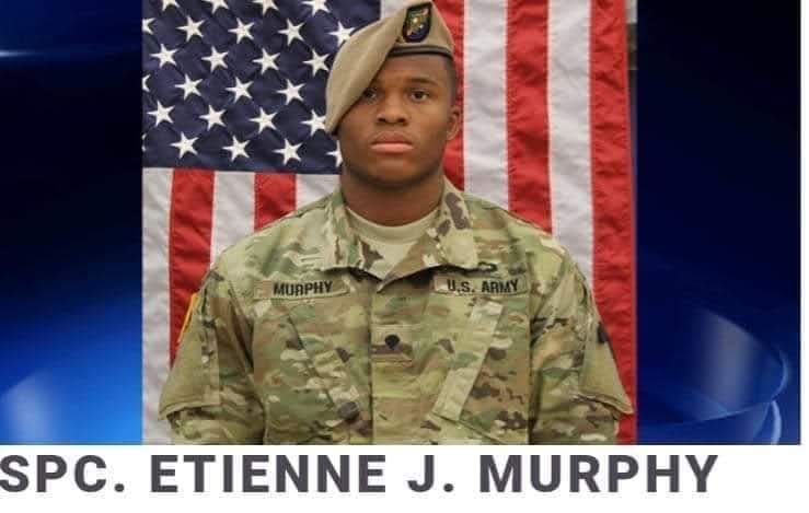 U.S. Army soldier in uniform, American flag.