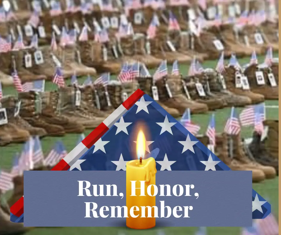 Military boots with flags, candle, folded flag.